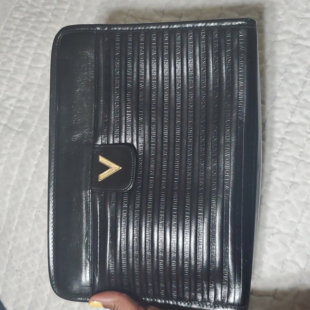 Valentino monogram embossed clutch